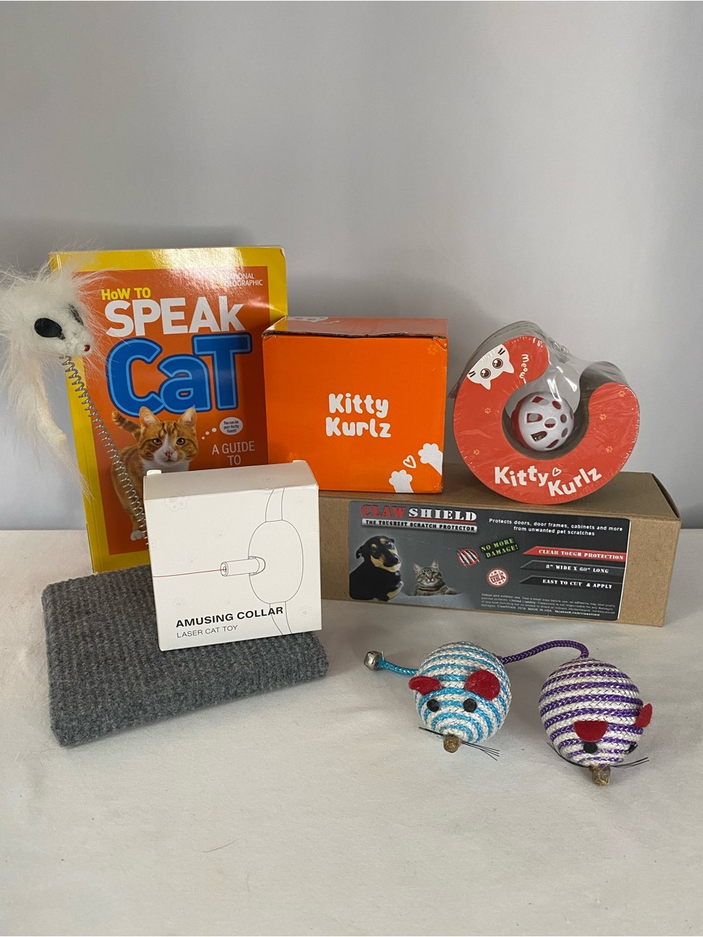 Cat Toys, Kitty Kurlz Toy and “How to Speak Cat” Book